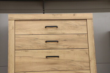 A stylish Modern Wooden Dresser with three spacious drawers for optimal organization