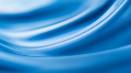 Blue gradient defocused abstract photo with smooth lines and a Pantone color background. The image creates a serene and sophisticated atmosphere through its smooth gradient and soft focus effect.