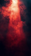 Red smoky light beam shining through darkness in a mysterious atmosphere at night