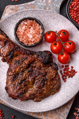 Grilled wagyu beef tomahawk steak with salt, spices and herbs