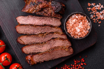 Grilled wagyu beef tomahawk steak with salt, spices and herbs