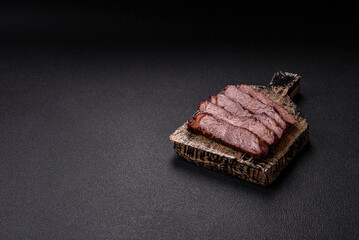 Grilled wagyu beef tomahawk steak with salt, spices and herbs