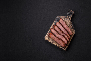 Grilled wagyu beef tomahawk steak with salt, spices and herbs