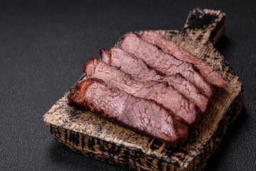 Grilled wagyu beef tomahawk steak with salt, spices and herbs