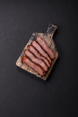 Grilled wagyu beef tomahawk steak with salt, spices and herbs