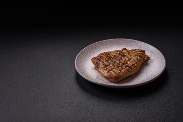 Grilled beef or pork steak with salt, spices and herbs