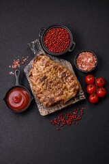 Grilled beef or pork steak with salt, spices and herbs