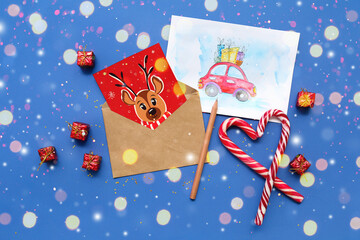 Beautiful composition with Christmas cards on blue background
