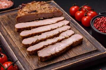 Grilled beef or pork steak with salt, spices and herbs