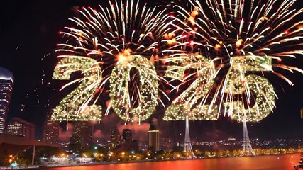 Colorful fireworks celebration for New Year 2025 over city skyline, creating festive night filled with joy and excitement in vibrant lights.