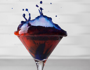 Glass with painted water up and splash