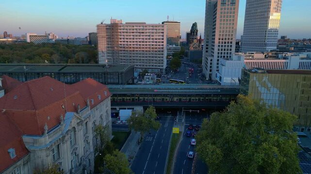 Berlin station zoologischer garten, sunset. Smooth aerial view flight drone