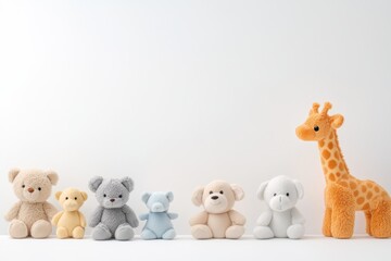 Assortment of cute and cuddly plush toys on a white background