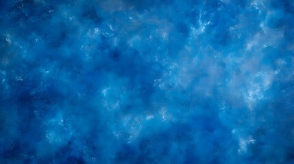 Obraz premium Studio portrait backdrop with traditional painted canvas or muslin fabric, featuring dramatic blue modulations