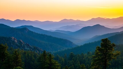 Naklejka premium Sunrise over the mountains, with the early morning light illuminating the rugged peaks in a warm, golden glow