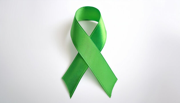 Green awareness ribbon on white backdrop. International symbol of mental health awareness.