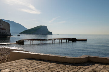 Budva pier and St. Nikola island at the back