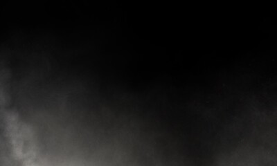 Dark nebula smoke on a dark background, creating a mysterious atmosphere. Abstract image with soft fog, dim, vapor ideal for backgrounds, cover design, posters and other creative projects.