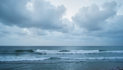 Fototapeta premium Serene ocean view with gentle waves and cloudy sky, capturing tranquility and nature’s beauty, copy space