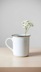 Enamel mug mockup with a gypsophila in a vase on a beige table isolated with white highlights, png
