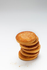 stack of round, sugar cookies on white background, copy space