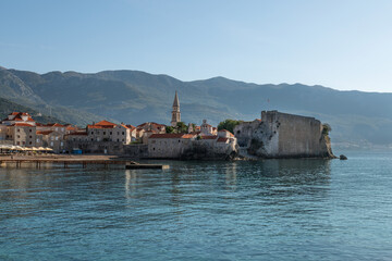 Budva Fortress walls of old town. Bell tower of  St. John the Baptist’s Church