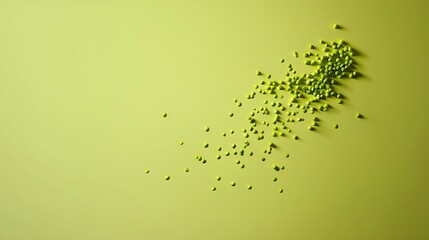   A cluster of minute green items against a mild green backdrop, providing room for insertion of text or graphics onto a card or brochure