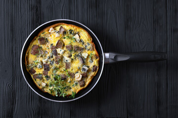 omelette with blue cheese, rye croutons and thyme