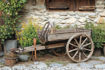 Obraz premium Rustic Handcart with Garden Tools at Countryside – Summer Harvest Preparation Visual