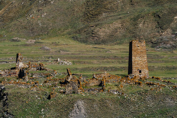 View on the ruins of an old watchtower in the almost abandonned village of Ketrisi, in the Truso Gorge, located in the Kazbegi mountains region of Georgia