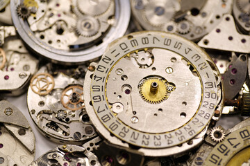 Old mechanical watches with gears and cogs. Watch or clock mechanisms