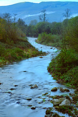 Flowing Saja River in Cabuerniga Valley, Cantabria, Spain