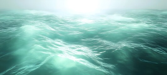 A serene view of tranquil turquoise ocean waves under soft sunlight, creating a peaceful and calm atmosphere, perfect for relaxation and inspiration.