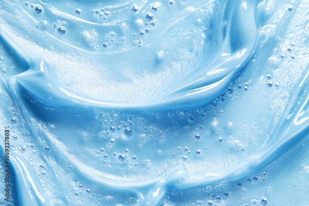 Poster a close-up view of a blue liquid with visible bubbles
