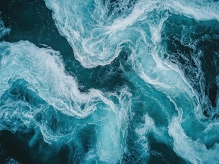Fototapeta premium An aerial view of swirling ocean water creating a beautiful abstract pattern.