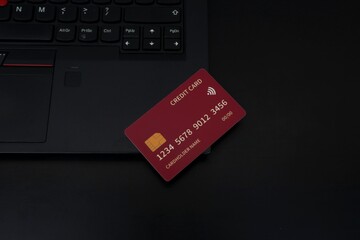 credit card on black laptop