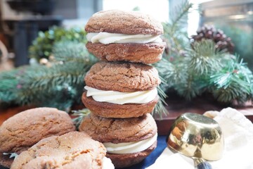 Homemade gingerbread whoopie pies with cream cheese icing.  Best dessert or baked goods for holiday parties or when your feeling cozy.