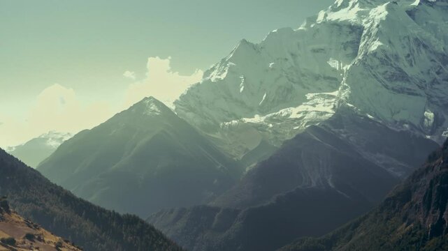 Prayer flags sway in wind in front of Annapurna II snow face nearby Ghyaru village, Nepal, Annapurna Circuit