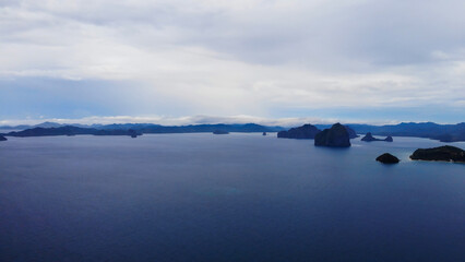 Aerial view of the islands of a tropical archipelago at sunset