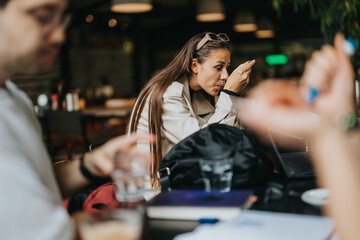 High school students collaborate on homework while enjoying a relaxed afternoon in a cozy coffee bar, fostering friendship and learning.
