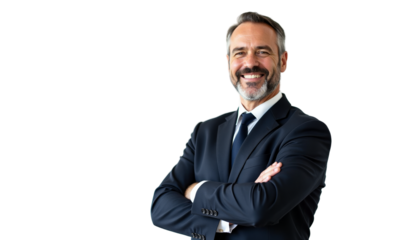 Confident middle-aged businessman in a suit smiling with crossed arms in a modern office setting during the workday