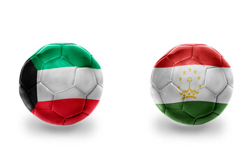 Fototapeta premium football balls with national flags of tajikistan and kuwait ,soccer teams. on the white background.