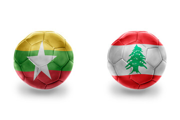 football balls with national flags of lebanon and myanmar ,soccer teams. on the white background.