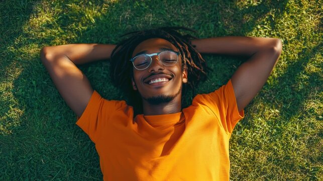Relaxation in the park: person enjoying a sunny day on the grass
