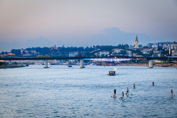 Paddleboarders on the Sava River in Belgrade, Serbia.