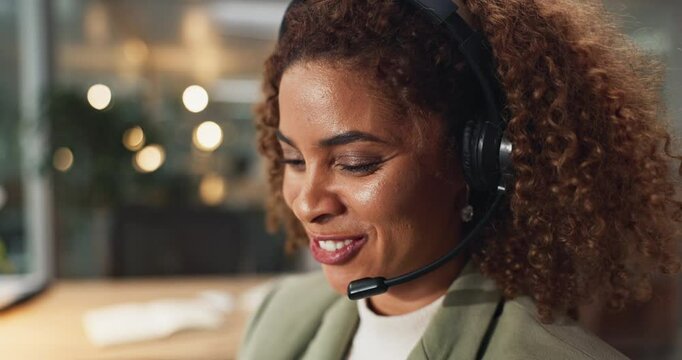 African woman, call center and happy at office, talking and advice with telemarketing at night. Person, consultant and headset with mic, smile and customer service on voip for tech support at startup