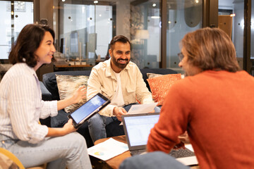 Collaborative Team Meeting in a Modern Coworking Space