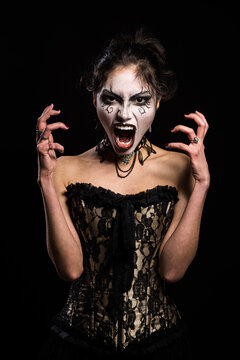 Dramatic Gothic Woman with Intense Makeup and Expression