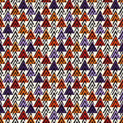 Paint brush triangles ornament. Seamless pattern. Hand drawn geometrical backdrop. Triangular shapes wallpaper. Geometric background. Ethnic motif. Tribal digital paper. Textile print. Chevrons vector