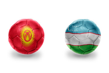 football balls with national flags of uzbekistan and kyrgyzstan ,soccer teams. on the white...